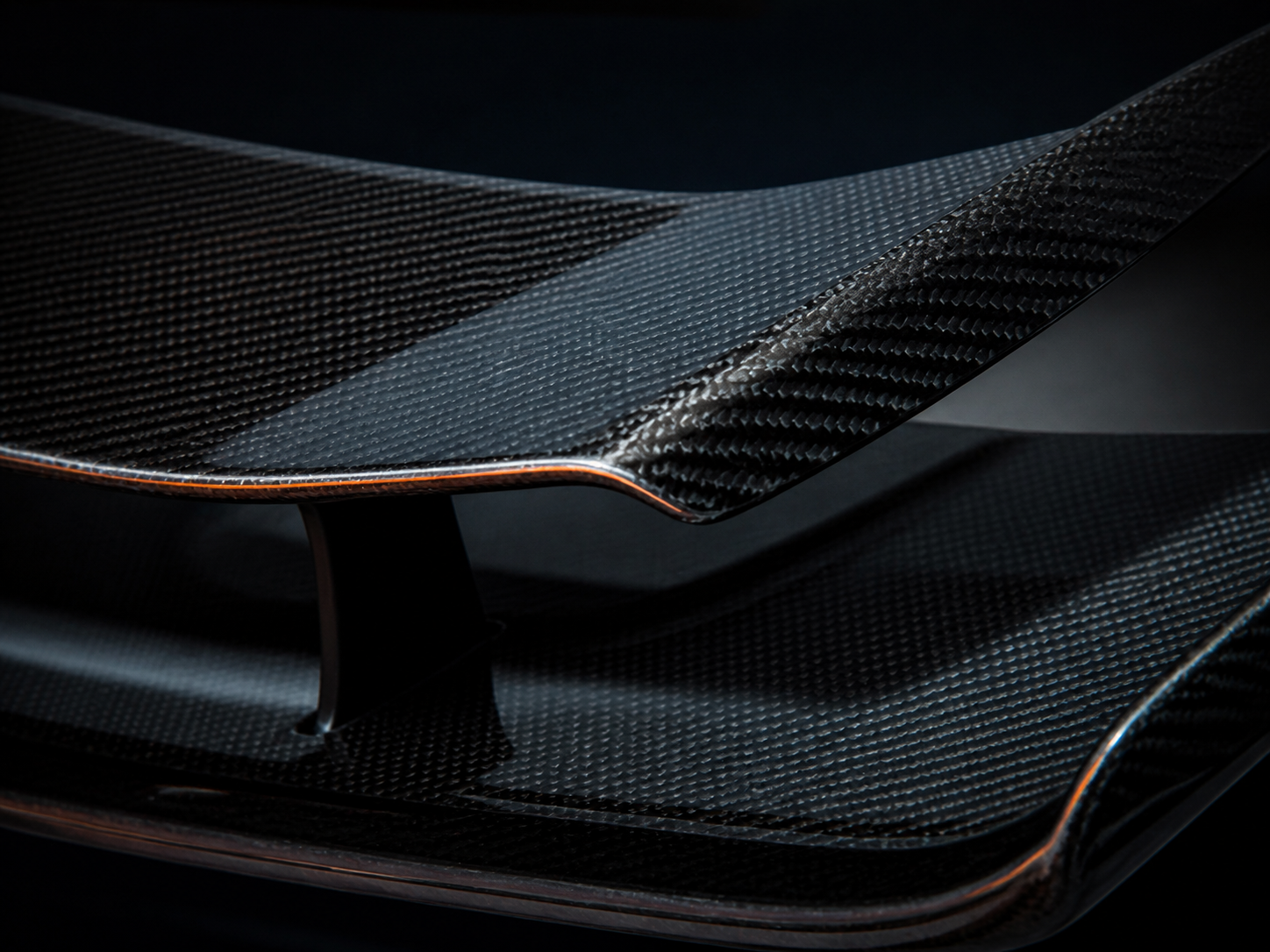 Close-up of a finished carbon fiber automotive component