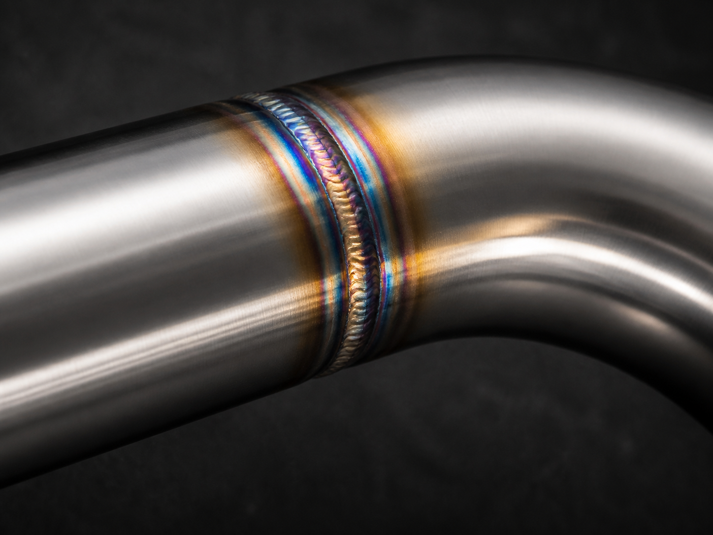 Precision TIG weld on a finished titanium exhaust tube